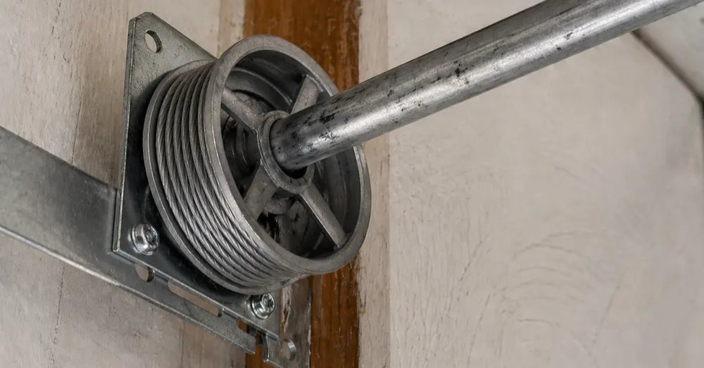 Garage door lift cable and roller on the track